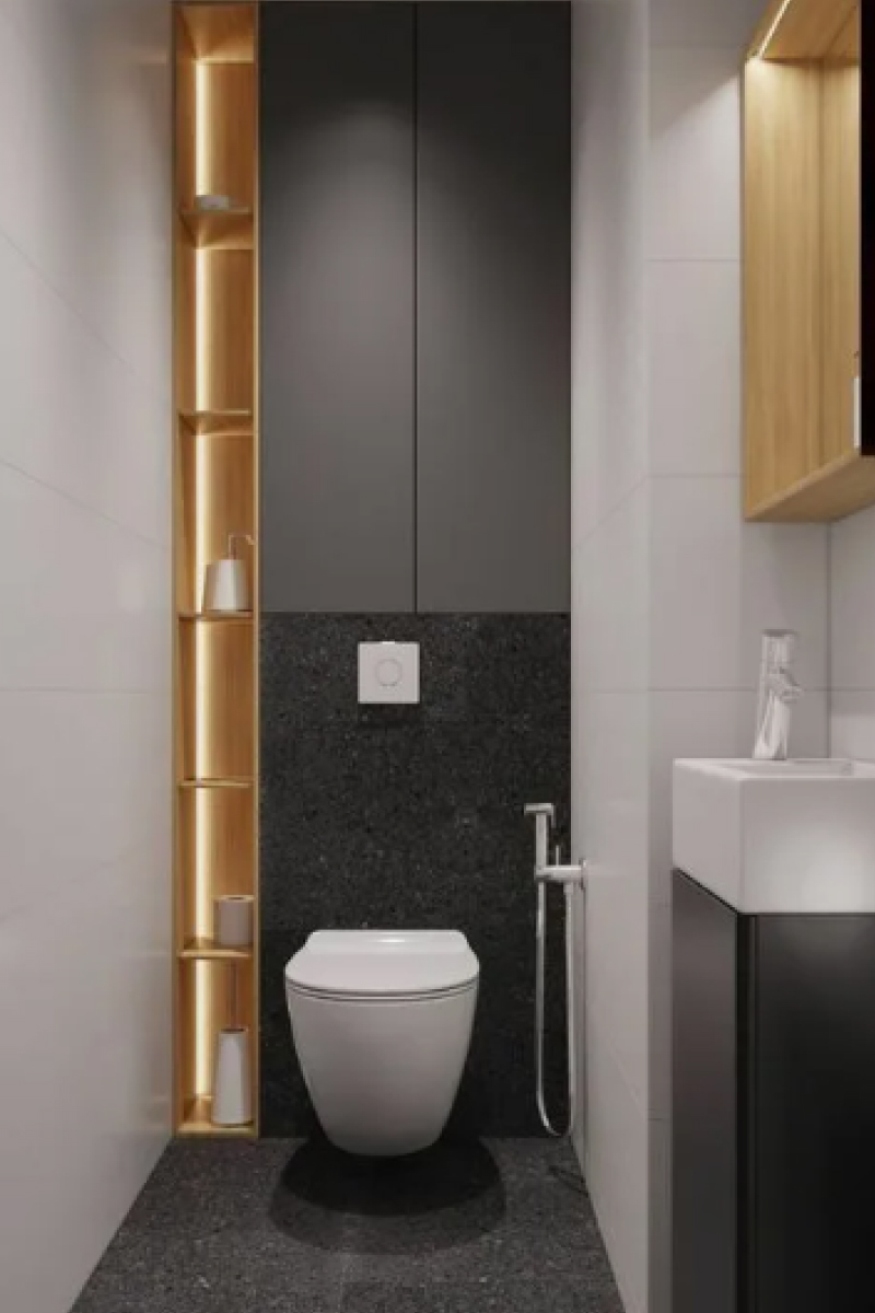 Шкафы и ниши в стене скрывают коммуникации и дают дополнительные места хранения. Источник: студия дизайна Rerooms